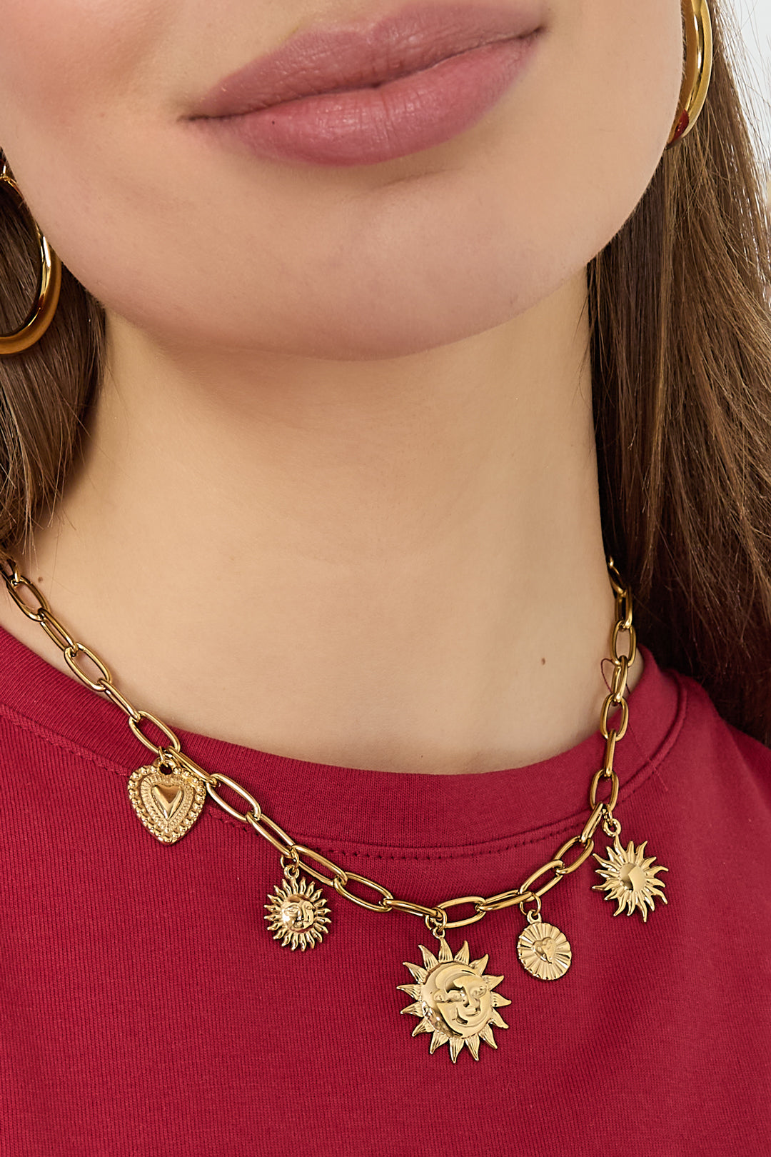 Necklace with sun and heart charms